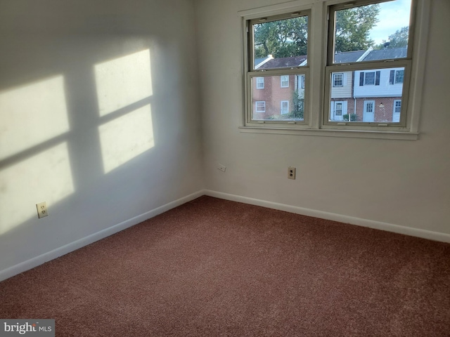 view of carpeted spare room