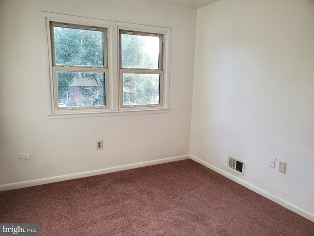 empty room with carpet floors