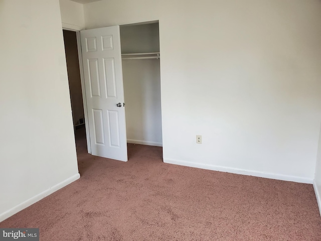 unfurnished bedroom with carpet flooring