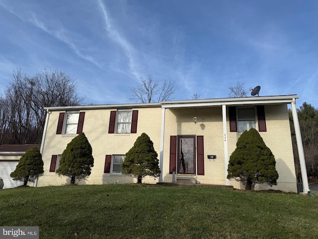 view of front of house featuring a front lawn