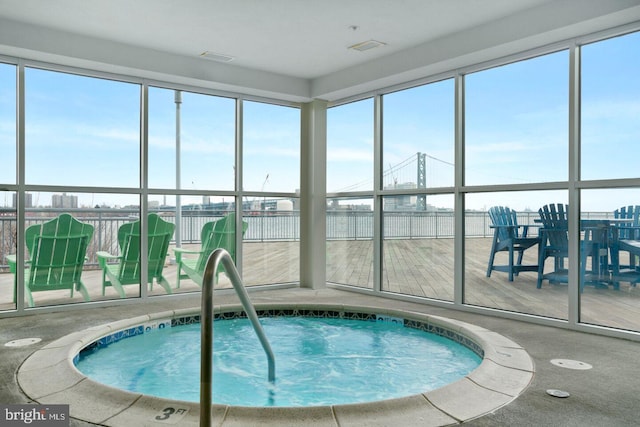 view of pool featuring an indoor in ground hot tub