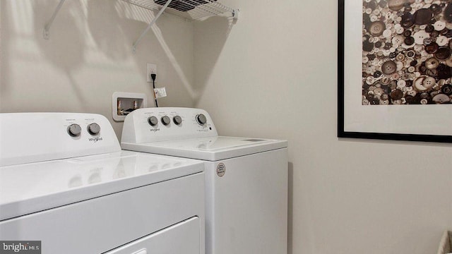 laundry area featuring washing machine and dryer