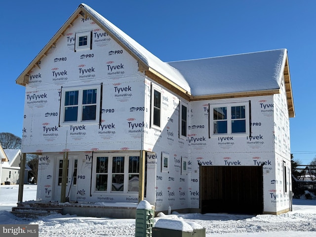 property under construction featuring a garage