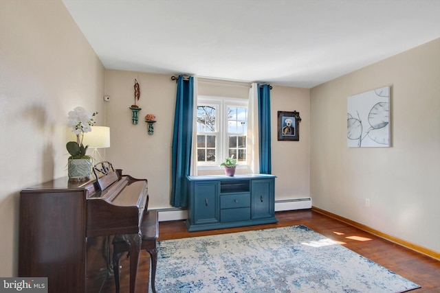 interior space with a baseboard radiator, dark wood finished floors, baseboard heating, and baseboards