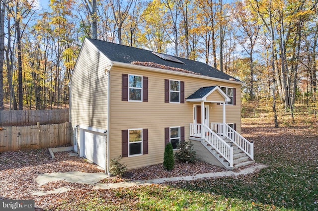 bi-level home featuring a garage