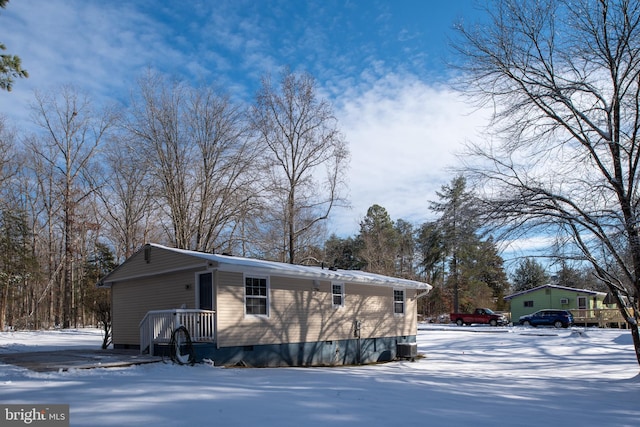 view of snow covered property