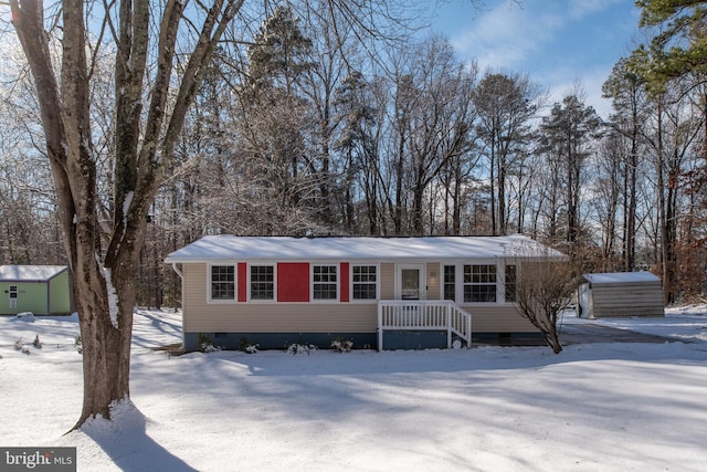 ranch-style house with an outbuilding