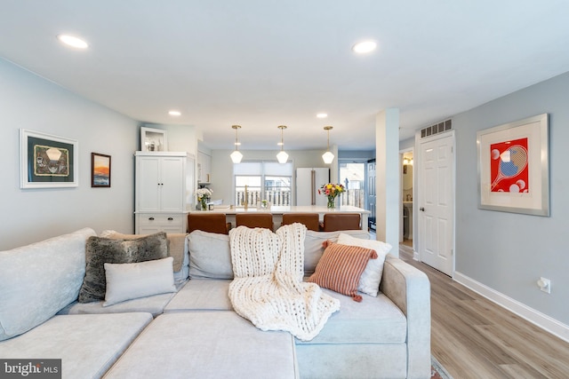 living room featuring light hardwood / wood-style floors