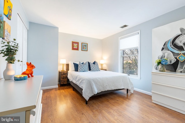 bedroom featuring light hardwood / wood-style flooring