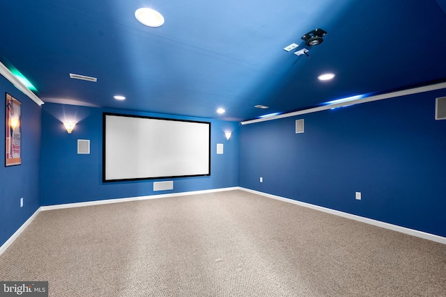 cinema room with recessed lighting, baseboards, and carpet