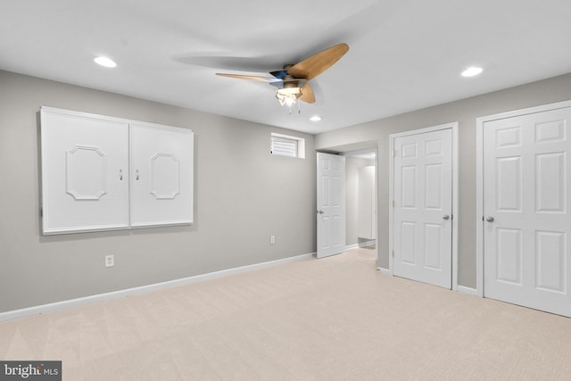 unfurnished bedroom with recessed lighting, carpet, and baseboards