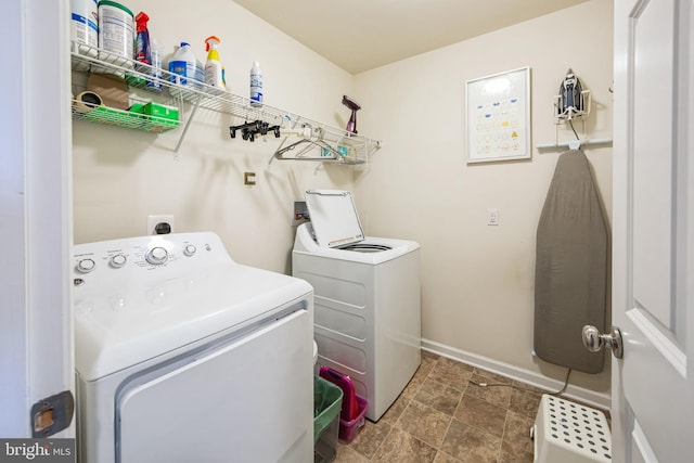 laundry area with separate washer and dryer