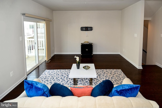 living room with dark wood-type flooring