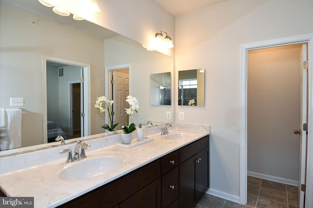 bathroom featuring vanity and tile patterned floors