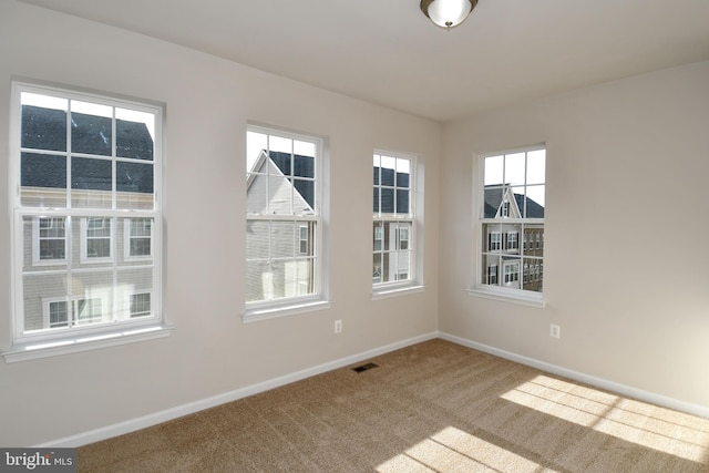 view of carpeted spare room