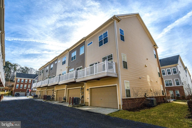 exterior space with central air condition unit