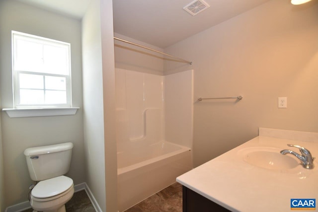 full bathroom with shower / tub combination, vanity, and toilet