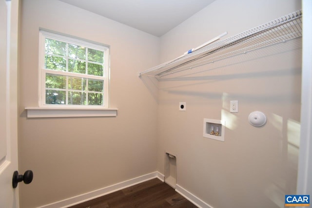 laundry area featuring hookup for an electric dryer, dark hardwood / wood-style floors, and hookup for a washing machine