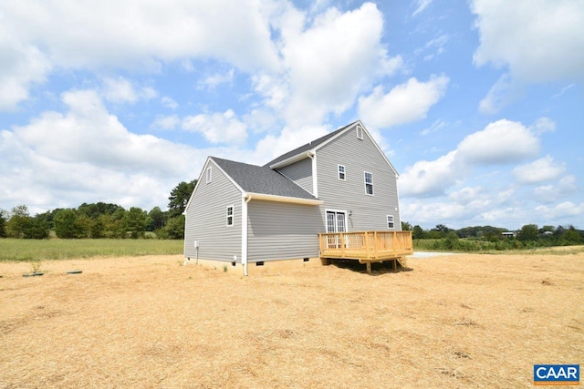 back of house with a wooden deck