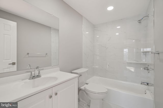 full bathroom featuring toilet, vanity, and bathing tub / shower combination