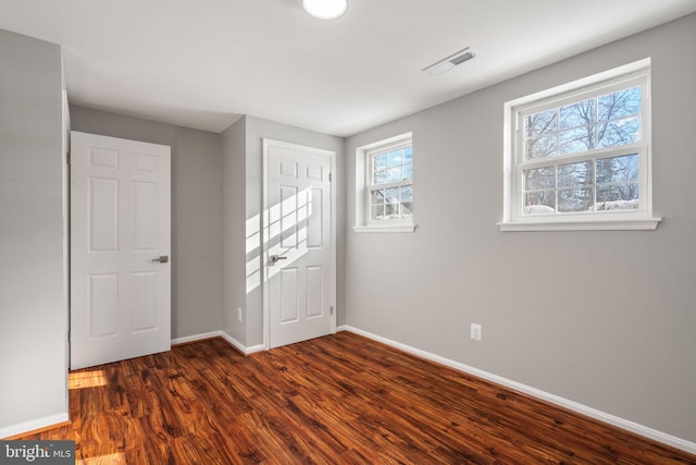 interior space featuring dark hardwood / wood-style flooring