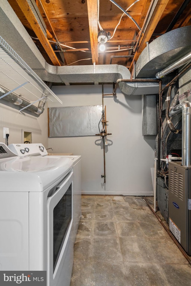 laundry room with washing machine and dryer