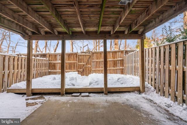 view of snow covered patio