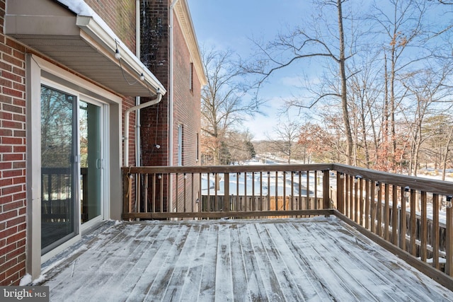 view of snow covered deck