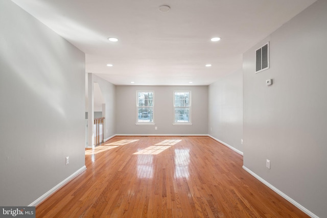 spare room featuring light hardwood / wood-style flooring