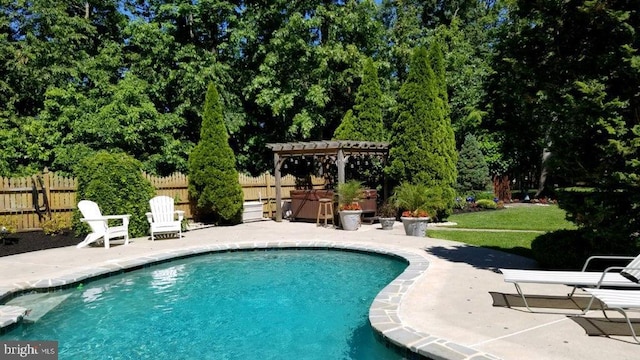 view of pool with a patio and a pergola