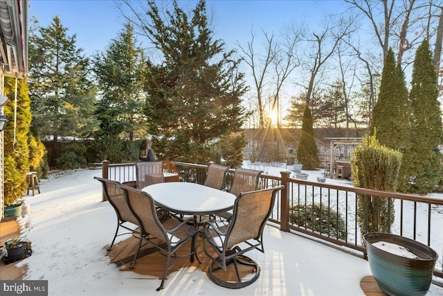 view of snow covered deck