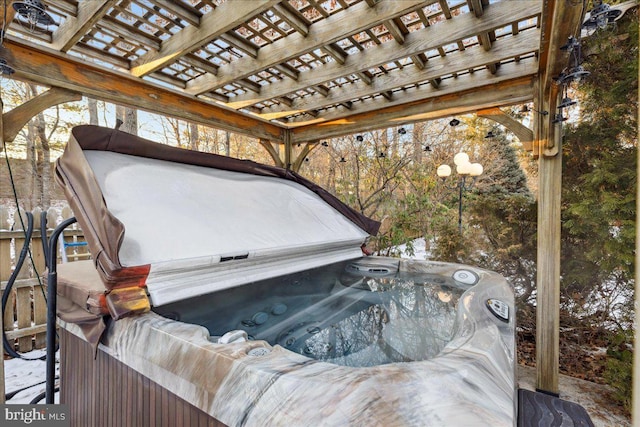 view of patio featuring a hot tub and a pergola