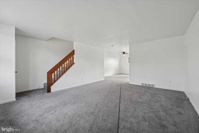 carpeted empty room with ceiling fan