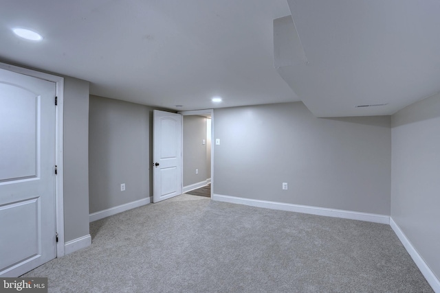 basement with light carpet