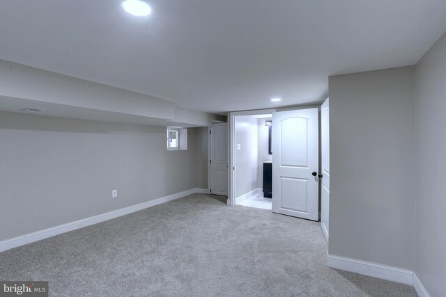 basement with light carpet