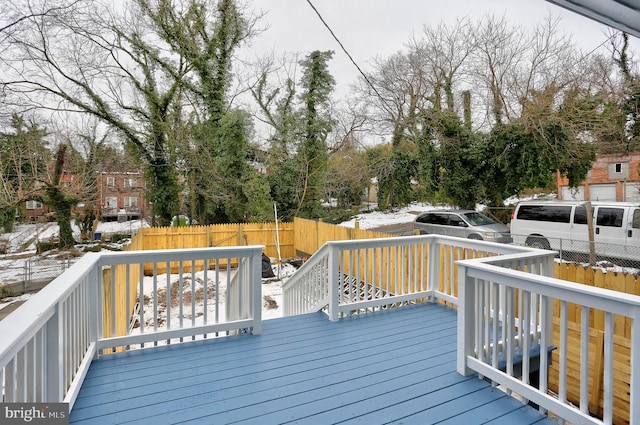 view of snow covered deck