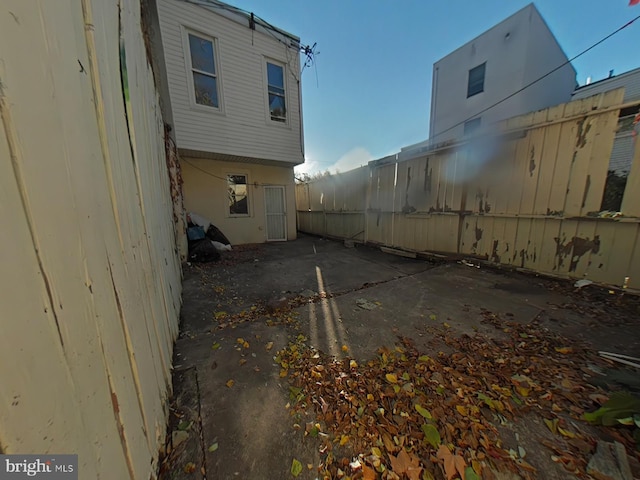 view of property exterior featuring a patio area