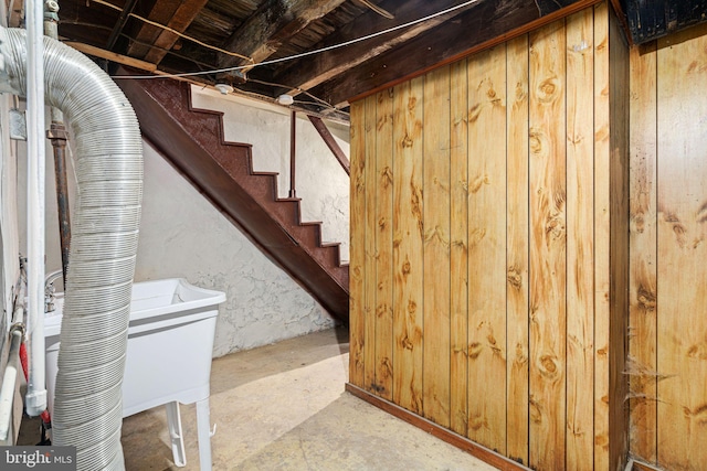 basement with wood walls