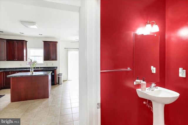 bathroom with tile patterned flooring