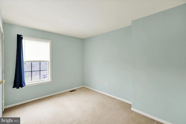 view of carpeted spare room