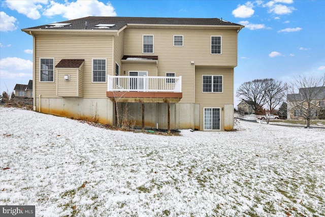 view of snow covered house