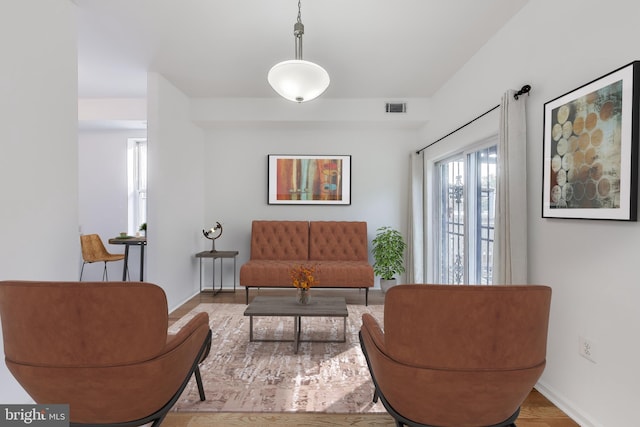 sitting room with light wood-type flooring