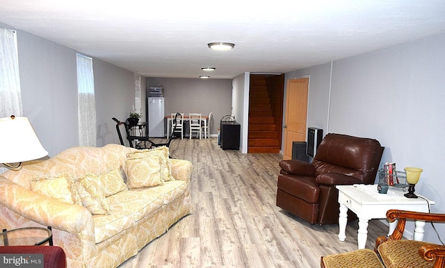 living room featuring light wood-type flooring