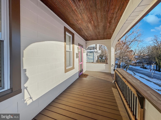 view of snow covered deck