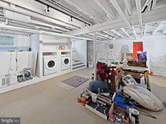 basement with washing machine and dryer