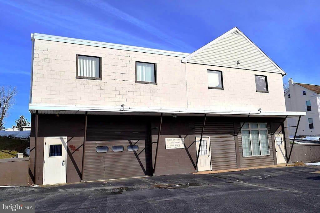 exterior space with a garage