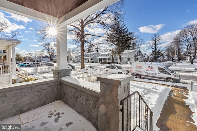 view of snow covered patio