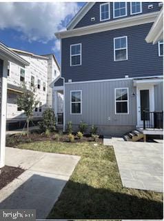 back of house with a patio area