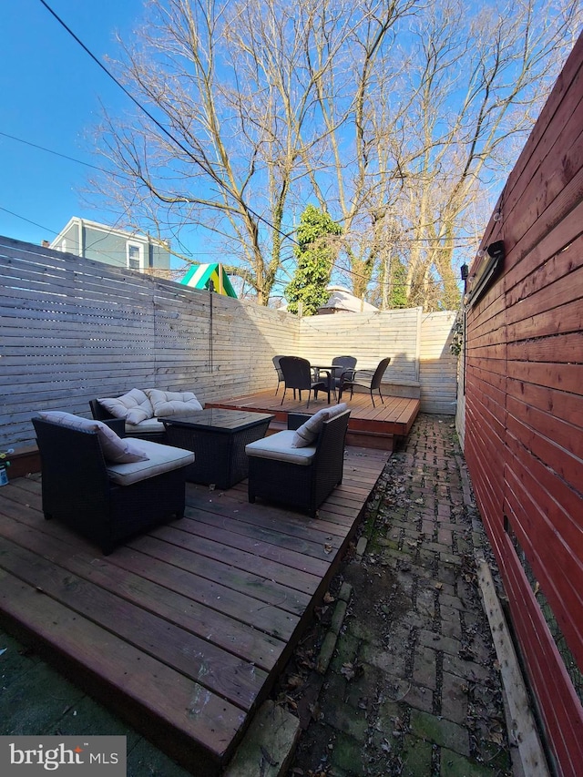 deck with an outdoor living space