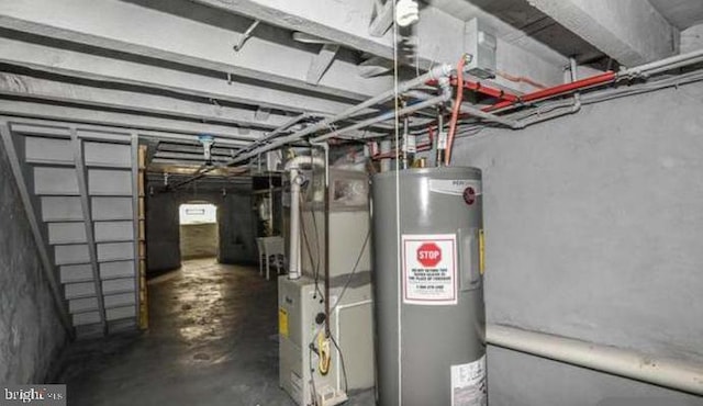 utility room featuring electric water heater